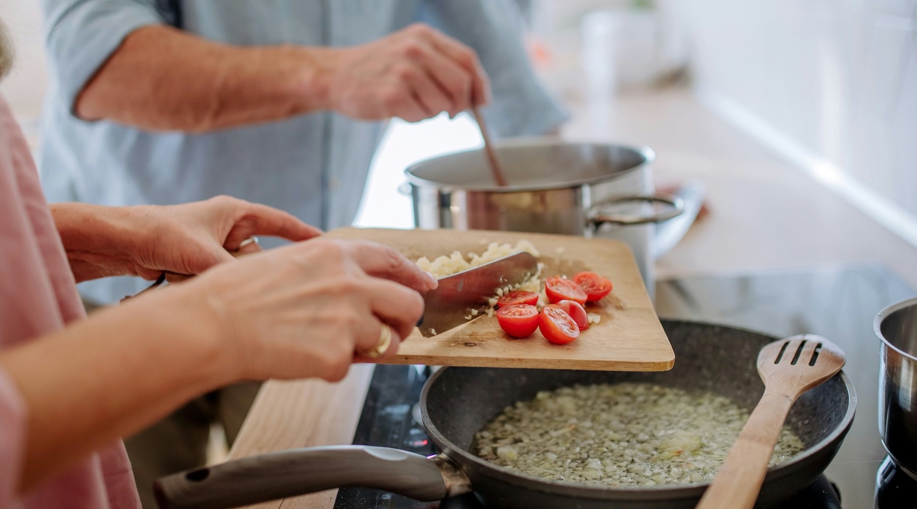 people cooking in a kitchen